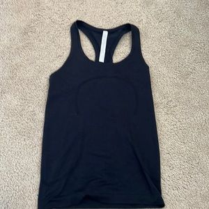 Black lululemon swiftly tech tankin size 4!